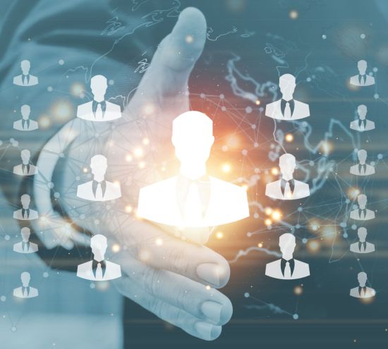 Businessman on blurred background with people connection icon and business leadership chart